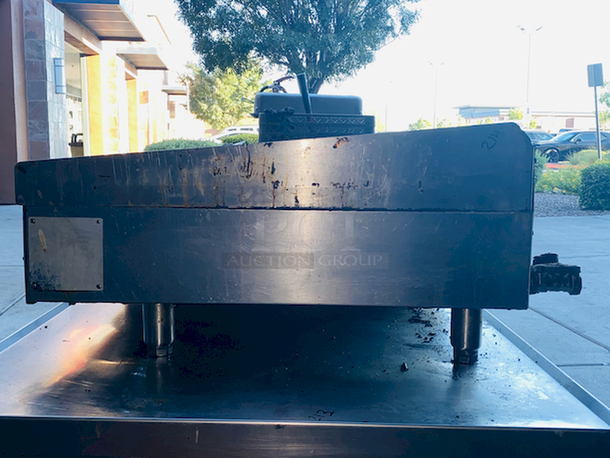 BUILT FOR HEAVY DUTY & HEAVY USE! Vulcan MSA-60-101 60" Countertop Natural Gas Griddle with Snap-Action Thermostatic Controls - 135,000 BTU.

Width	60 Inches
Depth	31 1/2 Inches
Height	15 1/4 Inches
Cooking Surface Width	60 Inches
Cooking Surface Depth	24 Inches

Stainless steel front, sides and front top ledge. Fully welded stainless and aluminized steel body frame. 11" low profile cooking height on 4" legs. 1" thick polished steel griddle plate with 12 gage, 4" stainless steel back and tapered side splashes. Grease chute is fully welded to stop grease migration. One 27,000 BTU/hr. “U” shaped aluminized steel burner and mechanical snap action thermostat for each 12" of griddle width. Chrome thermostat knob guards. Temperature adjusts from 200° to 550° F. One pilot safety for every two burners. - Image 3 of 10