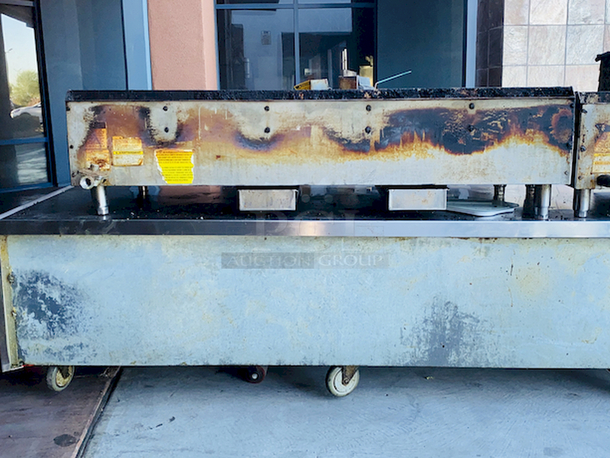 BUILT FOR HEAVY DUTY & HEAVY USE! Vulcan MSA-60-101 60" Countertop Natural Gas Griddle with Snap-Action Thermostatic Controls - 135,000 BTU.

Width	60 Inches
Depth	31 1/2 Inches
Height	15 1/4 Inches
Cooking Surface Width	60 Inches
Cooking Surface Depth	24 Inches

Stainless steel front, sides and front top ledge. Fully welded stainless and aluminized steel body frame. 11" low profile cooking height on 4" legs. 1" thick polished steel griddle plate with 12 gage, 4" stainless steel back and tapered side splashes. Grease chute is fully welded to stop grease migration. One 27,000 BTU/hr. “U” shaped aluminized steel burner and mechanical snap action thermostat for each 12" of griddle width. Chrome thermostat knob guards. Temperature adjusts from 200° to 550° F. One pilot safety for every two burners. - Image 5 of 10