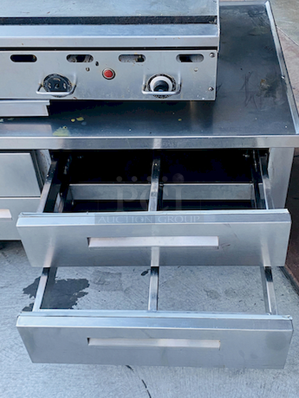 AMAZING! 6 Drawer Refrigerated Chef Base! Observed in perfect working order. 115v. On Commercial Casters. Width: 96" Depth: 34 1/8"
Height: 26".

6 drawers; each holds (2) 12" x 20" x 6" food pans
3" casters with adjustable channels; maximum top capacity of 1500 lb.
Stainless steel construction; side, front, and rear access panels - Image 8 of 10