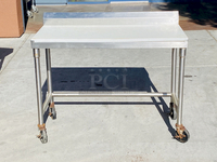 AWESOME!! Stainless Steel Table 48" LONG
Custom Model No. 3PTCT-30
Cutting Table, 48"x24" x 40", all-welded construction, NSF. To include 1/2" poly top, and 5" backsplash, 18 gauge, 304 stainless steel undershelf, 16 gauge, 304 stainless steel frame and legs, On COMMERCIAL Casters

