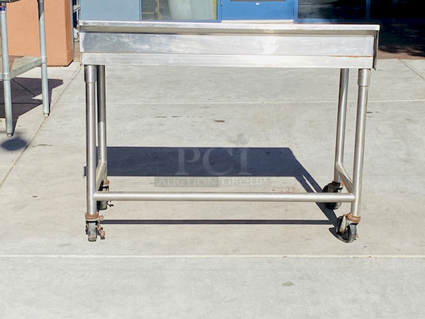 AWESOME!! Stainless Steel Table 48" LONG
Custom Model No. 3PTCT-30
Cutting Table, 48"x24" x 40", all-welded construction, NSF. To include 1/2" poly top, and 5" backsplash, 18 gauge, 304 stainless steel undershelf, 16 gauge, 304 stainless steel frame and legs, On COMMERCIAL Casters

 - Image 4 of 4