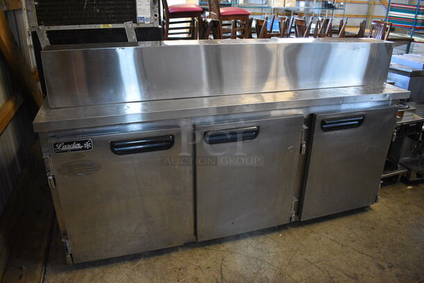 NICE! 2014 Leader Model ESLM72S/C Stainless Steel Commercial Cooler w/ 2 Lids and 3 Doors. 115 Volts, 1 Phase. 72x32x40. Tested and Working! - Image 1 of 11