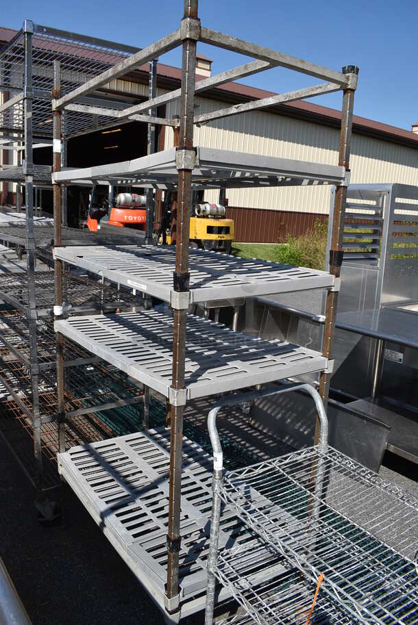 Metal 5 Tier Shelving Unit w/ Poly Shelf Covers. 42x24x84. BUYER MUST DISMANTLE. PCI CANNOT  DISMANTLE FOR SHIPPING. PLEASE CONSIDER FREIGHT CHARGES. - Image 1 of 3