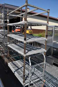 Metal 5 Tier Shelving Unit w/ Poly Shelf Covers. 42x24x84. BUYER MUST DISMANTLE. PCI CANNOT  DISMANTLE FOR SHIPPING. PLEASE CONSIDER FREIGHT CHARGES.