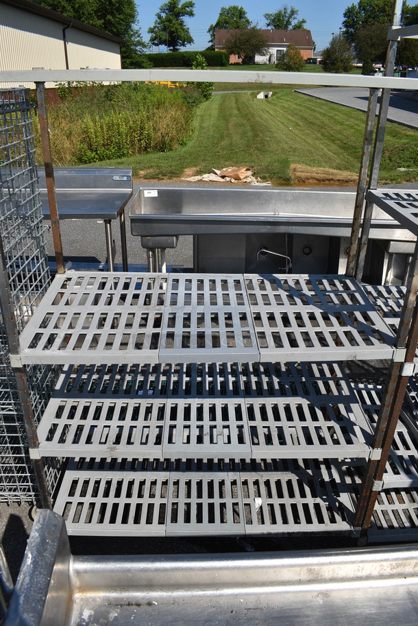 Metal 4 Tier Shelving Unit w/ Poly Shelf Covers. 48x24x84. BUYER MUST DISMANTLE. PCI CANNOT  DISMANTLE FOR SHIPPING. PLEASE CONSIDER FREIGHT CHARGES. - Image 1 of 3