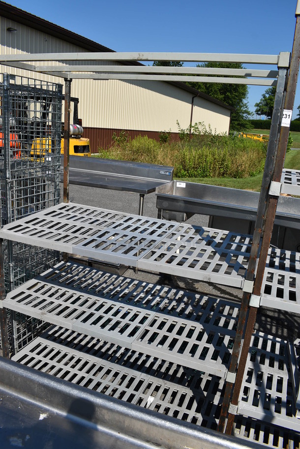 Metal 4 Tier Shelving Unit w/ Poly Shelf Covers. 48x24x84. BUYER MUST DISMANTLE. PCI CANNOT  DISMANTLE FOR SHIPPING. PLEASE CONSIDER FREIGHT CHARGES. - Image 2 of 3