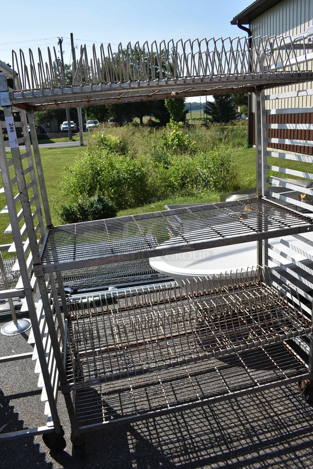 Metal 4 Tier Shelving Unit on Commercial Casters. 48x24x68. BUYER MUST DISMANTLE. PCI CANNOT  DISMANTLE FOR SHIPPING. PLEASE CONSIDER FREIGHT CHARGES. - Image 3 of 3