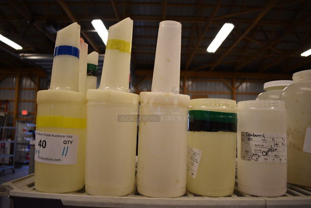 ALL ONE MONEY! Lot of 11 White Poly Containers w/ 7 Pourer Tops. Includes 3.5x3.5x12 - Image 1 of 3