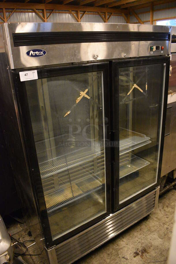 WOW! 2015 Atosa Model MCF8703 Stainless Steel Commercial 2 Door Reach In Freezer Merchandiser w/ Poly Coated Racks on Commercial Casters. 115 Volts, 1 Phase. 54x32x83. Tested and Powers On - Temps at 39 Degrees - Image 2 of 7