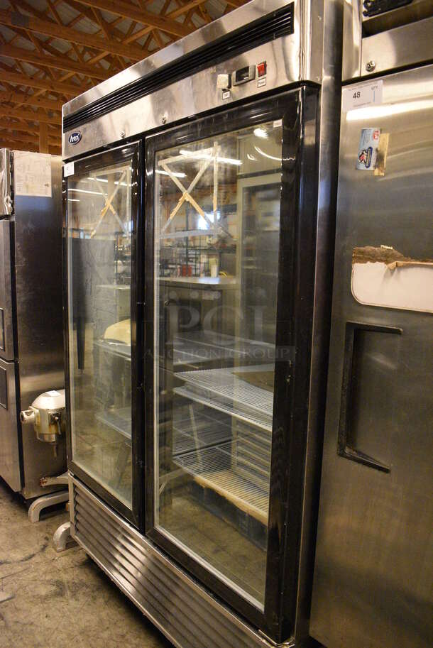 WOW! 2015 Atosa Model MCF8703 Stainless Steel Commercial 2 Door Reach In Freezer Merchandiser w/ Poly Coated Racks on Commercial Casters. 115 Volts, 1 Phase. 54x32x83. Tested and Powers On - Temps at 39 Degrees - Image 3 of 7