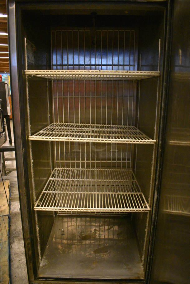 NICE! 2006 True Model TS-23F Stainless Steel Commercial 2 Half Size Door Reach In Freezer w/ Poly Coated Racks on Commercial Casters. 115 Volts, 1 Phase. 27x30x83. Tested and Powers On But Does Not Get Cold - Image 4 of 6
