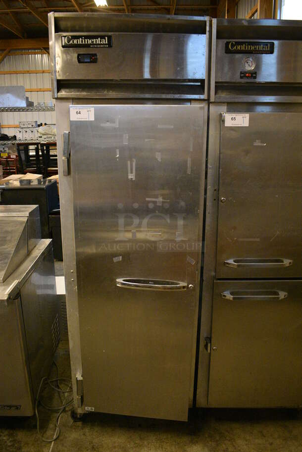 NICE! Continental Model 1R Stainless Steel Commercial Single Door Reach In Cooler on Commercial Casters. 115 Volts, 1 Phase. 26x34x82. Tested and Does Not Power On - Image 1 of 5