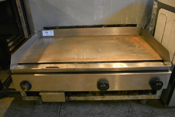 NICE! Stainless Steel Commercial Countertop Gas Powered Flat Top Griddle. 36x24x18 - Image 1 of 5