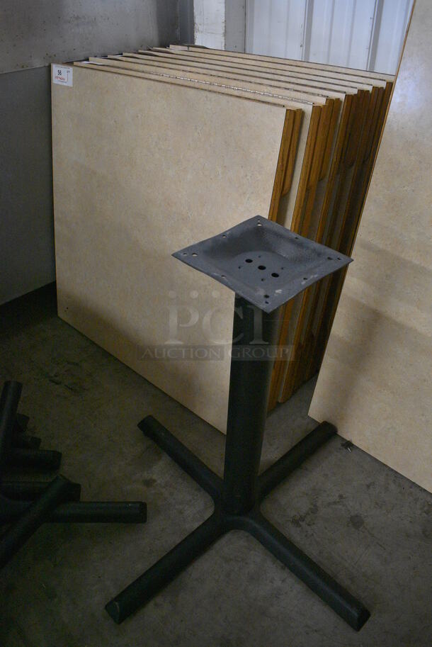 Drop Leaf Tabletop and Black Metal Table Base. Stock Picture - Cosmetic Condition May Vary. 33.5x33.5x30. Open: 48.5x33.5x30