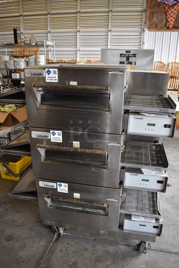 3 GORGEOUS! LATE MODEL! Lincoln Impinger Model 1132-002-U-K1841 Stainless Steel Commercial Electric Powered Conveyor Pizza Ovens on Commercial Casters. 208 Volts, 3 Phase. 57x44x62. 3 Times Your Bid!