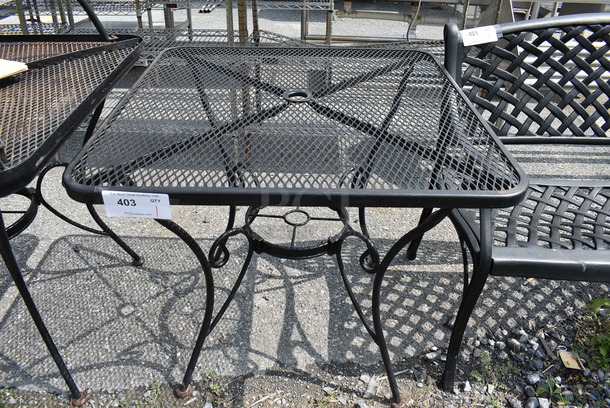 Black Metal Mesh Patio Table. Stock Picture - Cosmetic Condition May Vary. 30x30x29
