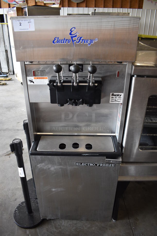 FANTASTIC! 2007 Electro Freeze Model 88T-RMT-137 Stainless Steel Commercial Floor Style Water Cooled 2 Flavor w/ Twist Soft Serve Ice Cream Machine on Commercial Casters. 208-230 Volts, 1 Phase. 24x33x68