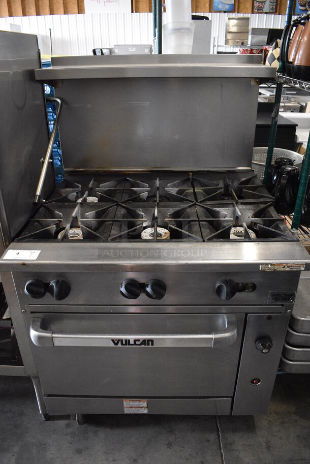 SWEET! LATE MODEL! Vulcan Stainless Steel Commercial Gas Powered 6 Burner Range w/ Lower Oven and Overshelf on Commercial Casters. 36x34x60