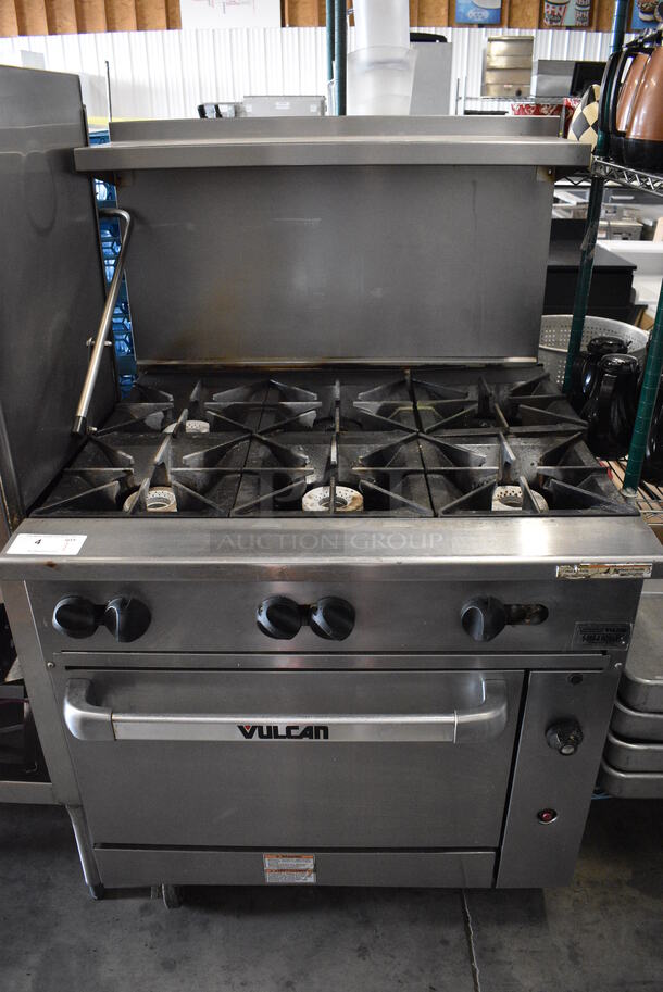 SWEET! LATE MODEL! Vulcan Stainless Steel Commercial Gas Powered 6 Burner Range w/ Lower Oven and Overshelf on Commercial Casters. 36x34x60 - Image 1 of 8