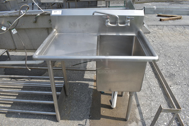 Stainless Steel Commercial Single Bay Sink w/ Left Side Drainboard, Faucet and Handles. 38x26x44. Bay 16x21x13. Drainboard 18x21x1