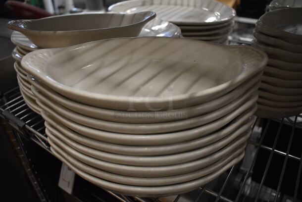 10 White Ceramic Single Serving Casserole Dishes. 9x5x1.5. 10 Times Your Bid!