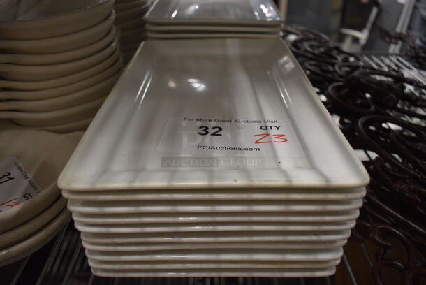 23 White Ceramic Rectangular Plates. 7x11x1. 23 Times Your Bid!