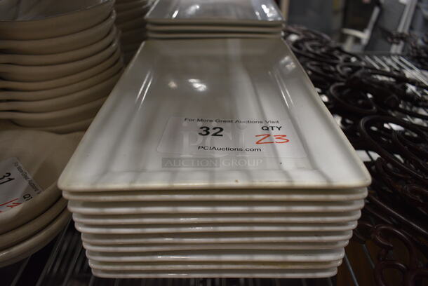 23 White Ceramic Rectangular Plates. 7x11x1. 23 Times Your Bid! - Image 1 of 5