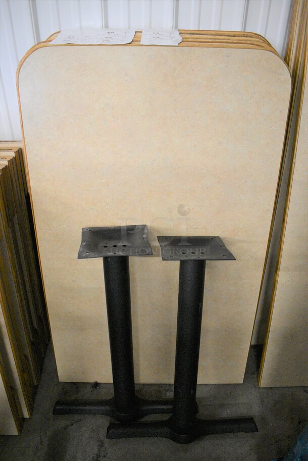 Tabletop w/ 1 Flat Edge and 2 Black Metal Straight Leg Table Bases. Stock Picture - Cosmetic Condition May Vary. 29.5x47.5x30