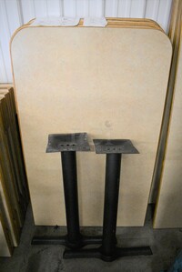 Tabletop w/ 1 Flat Edge and 2 Black Metal Straight Leg Table Bases. Stock Picture - Cosmetic Condition May Vary. 29.5x47.5x30