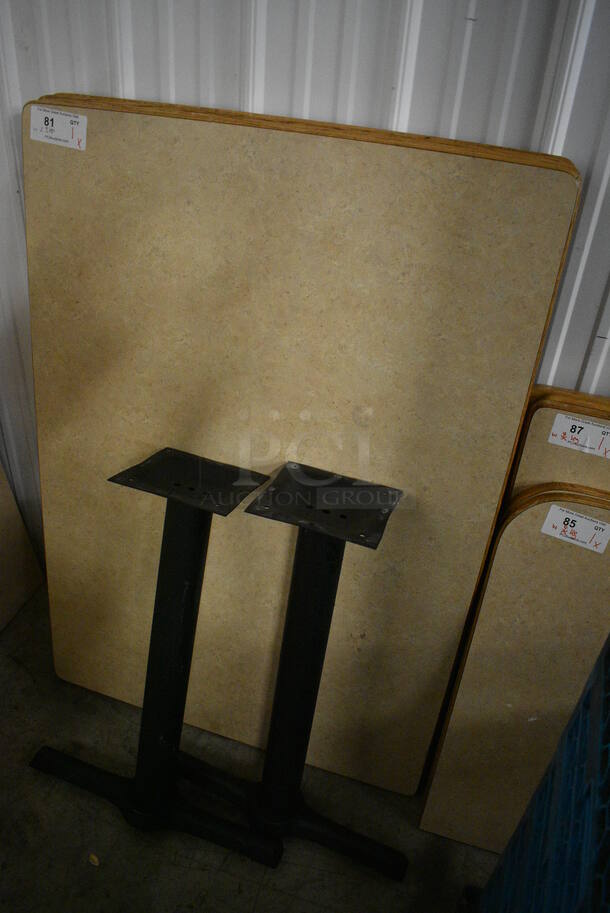 Tabletop and 2 Black Metal Straight Leg Table Bases. Stock Picture - Cosmetic Condition May Vary. 33.5x47.5x30 - Image 2 of 3
