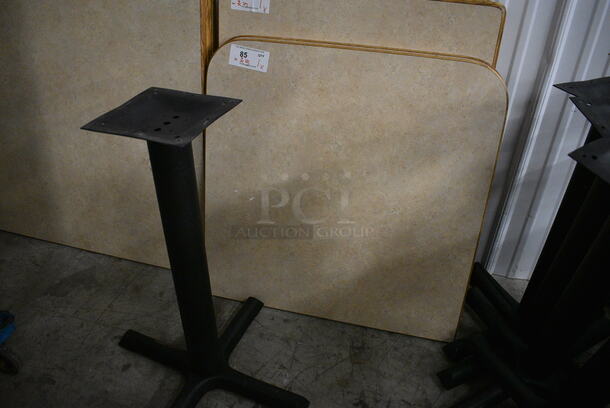 Tabletop and Black Metal Table Base. Stock Picture - Cosmetic Condition May Vary. 29.5x29.5x30