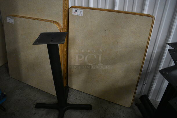 Tabletop and Black Metal Table Base. Stock Picture - Cosmetic Condition May Vary. 27.5x33.5x30