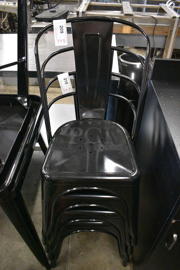 2 Black Metal Tolix Chairs. Stock Picture - Cosmetic Condition May Vary. 18x16x33. 2 Times Your Bid!