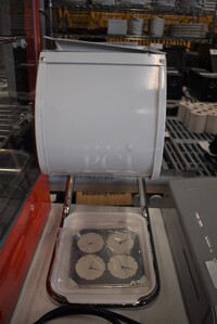 White Metal Countertop Cone Dispenser. 9x11x17