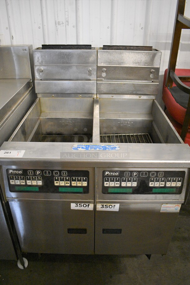 FANTASTIC! 2014 Pitco Frialator Model SG14 Stainless Steel Commercial Natural Gas Powered 2 Bay Deep Fat Fryer w/ Filtration System on Commercial Casters. 110,000 BTU. 31x34x47