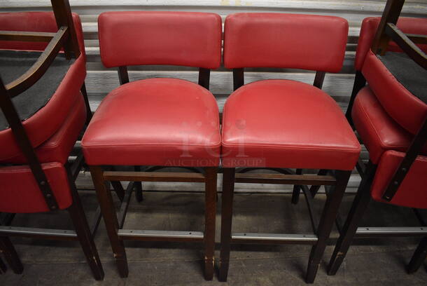 2 Wooden Bar Height Stools w/ Red Back Rest and Seat Cushion. Stock Picture - Cosmetic Condition May Vary. 17x17x41. 2 Times Your Bid! - Image 1 of 7