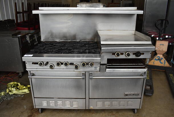 SWEET! Garland Stainless Steel Commercial Gas Powered 6 Burner Range w/ Right Side Flat Top Griddle, 2 Lower Ovens and Stainless Steel Overshelf on Commercial Casters. 60x33x58