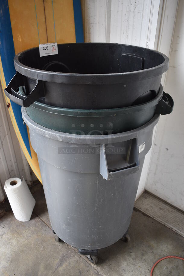 3 Various Poly Trash Cans on Trash Can Dolly. Includes 28x24x36. 3 Times Your Bid!