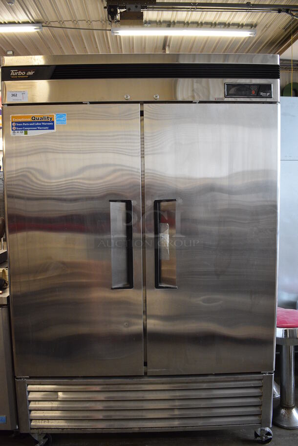 GREAT! 2012 Turbo Air Model TSR-49SD ENERGY STAR Stainless Steel Commercial 2 Door Reach In Cooler w/ Racks on Commercial Casters. 110-120 Volts, 1 Phase. 54x30x83. Tested and Working! - Image 1 of 7