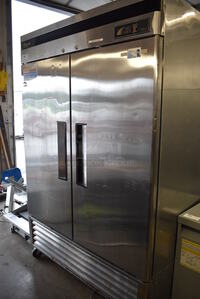 GREAT! 2012 Turbo Air Model TSR-49SD ENERGY STAR Stainless Steel Commercial 2 Door Reach In Cooler w/ Racks on Commercial Casters. 110-120 Volts, 1 Phase. 54x30x83. Tested and Working!