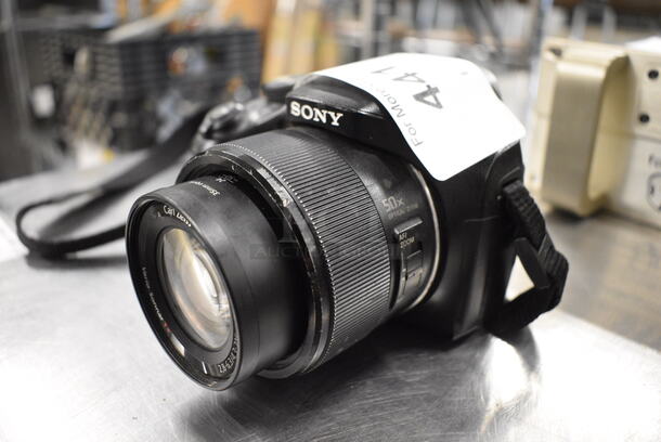 Sony DSC-HX300 Digital Camera w/ Battery and Neckstrap. 5x4x6. Does Not Power On.  - Image 2 of 7