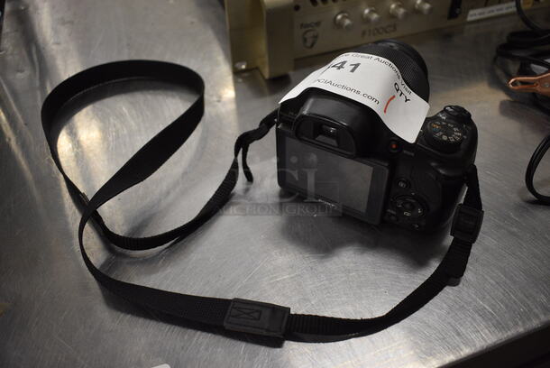 Sony DSC-HX300 Digital Camera w/ Battery and Neckstrap. 5x4x6. Does Not Power On.  - Image 5 of 7