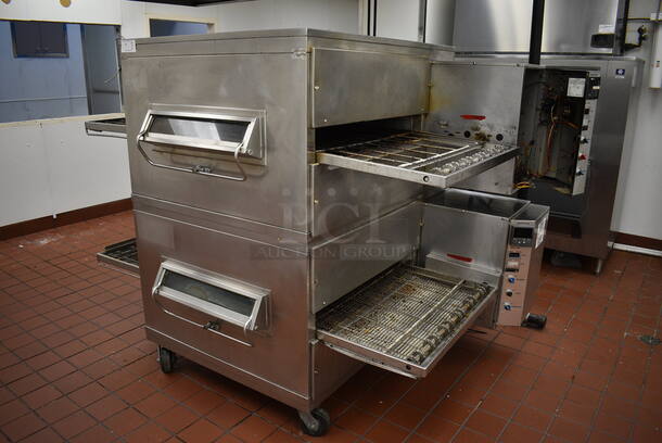 2 GORGEOUS! Stainless Steel Commercial Gas Powered Conveyor Pizza Ovens on Commercial Casters. Top Conveyor Belt Is Missing. Comes w/ 2 Gas Hoses! 79x58x64. 2 Times Your Bid! BUYER MUST REMOVE. Removal/Transport fee of $500.00 will be charged if we have to transport this item back to our warehouse for shipping or pick up - Image 2 of 9