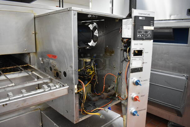 2 GORGEOUS! Stainless Steel Commercial Gas Powered Conveyor Pizza Ovens on Commercial Casters. Top Conveyor Belt Is Missing. Comes w/ 2 Gas Hoses! 79x58x64. 2 Times Your Bid! BUYER MUST REMOVE. Removal/Transport fee of $500.00 will be charged if we have to transport this item back to our warehouse for shipping or pick up - Image 4 of 9
