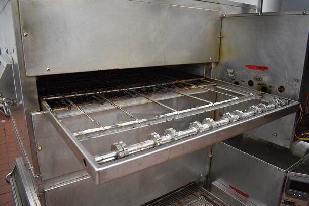 2 GORGEOUS! Stainless Steel Commercial Gas Powered Conveyor Pizza Ovens on Commercial Casters. Top Conveyor Belt Is Missing. Comes w/ 2 Gas Hoses! 79x58x64. 2 Times Your Bid! BUYER MUST REMOVE. Removal/Transport fee of $500.00 will be charged if we have to transport this item back to our warehouse for shipping or pick up - Image 5 of 9