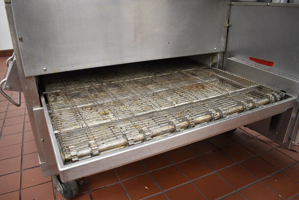 2 GORGEOUS! Stainless Steel Commercial Gas Powered Conveyor Pizza Ovens on Commercial Casters. Top Conveyor Belt Is Missing. Comes w/ 2 Gas Hoses! 79x58x64. 2 Times Your Bid! BUYER MUST REMOVE. Removal/Transport fee of $500.00 will be charged if we have to transport this item back to our warehouse for shipping or pick up - Image 6 of 9