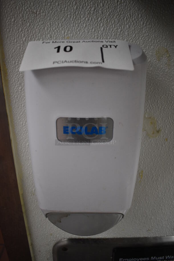 Ecolab White Poly Wall Mount Soap Dispenser. 5x4x9. BUYER MUST REMOVE - Image 1 of 3