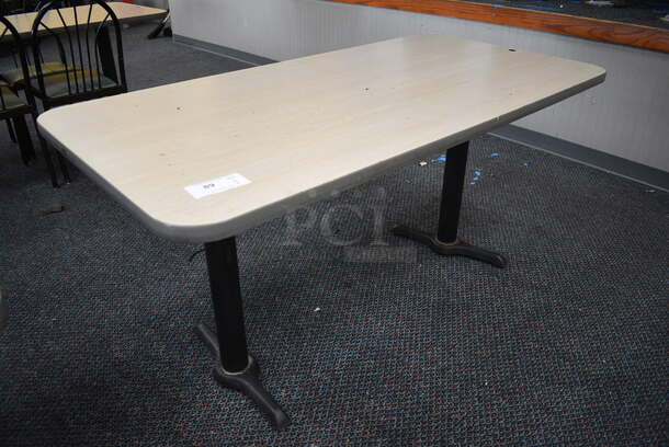 Table on 2 Black Metal Straight Leg Table Bases. 60x30x30