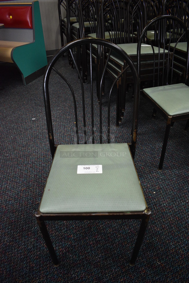 4 Black Metal Dining Chairs w/ Green Seats. Stock Picture - Cosmetic Condition May Vary. 17x17x36. 4 Times Your Bid! - Image 1 of 5