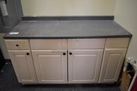 White Counter w/ Gray Countertop and 4 Doors. Includes Contents! 60.5x25.5x39. BUYER MUST REMOVE